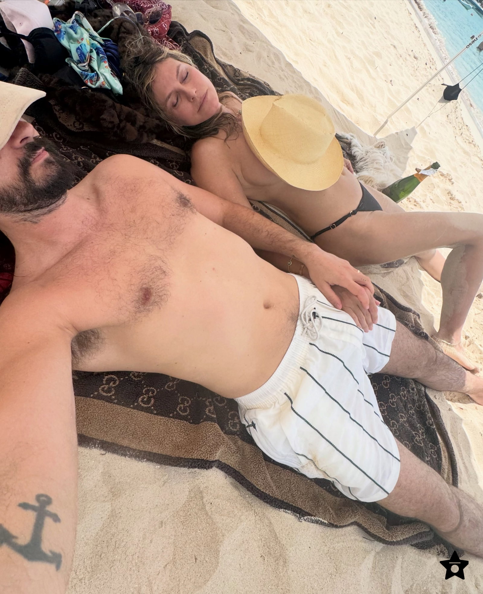 Heidi Klum hits the beach in a $40K necklace — and no bikini top