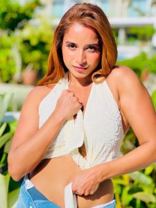 Pooja Bhalekar posing in leopard print and denim resort wear outfit