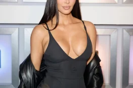 Kim Kardashian in a Sheer Black Dress and Leather Coat Leaves the UpDate Pop-Up on Melrose
