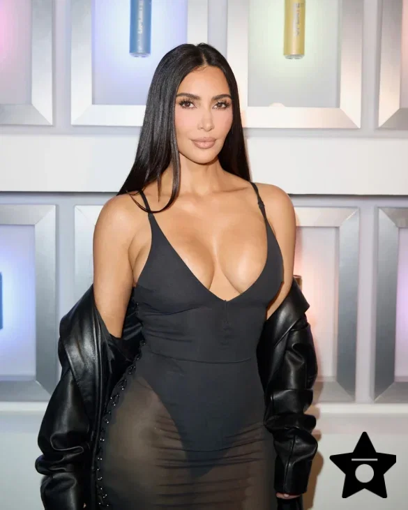 Kim Kardashian in a Sheer Black Dress and Leather Coat Leaves the UpDate Pop-Up on Melrose