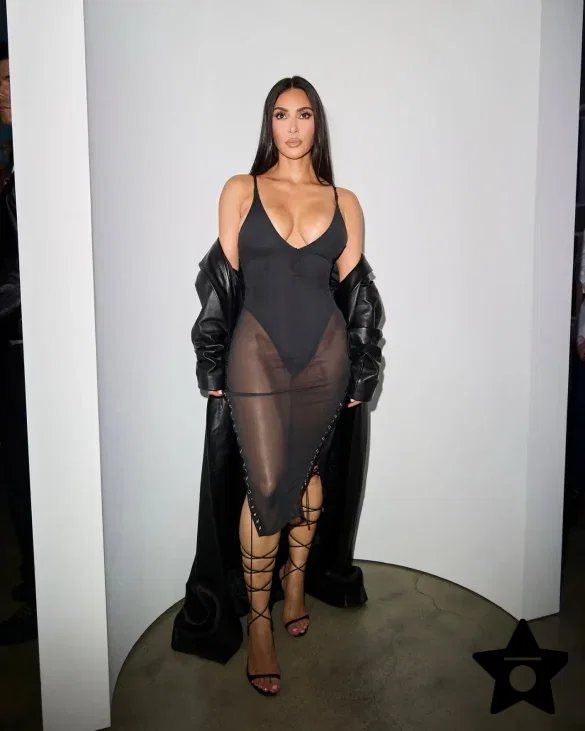 kim-kardashian-in-a-sheer-black-dress-and-leather-coat-leaves-the-update-pop-up-on-melrose-1 Kim Kardashian in a Sheer Black Dress and Leather Coat Leaves the UpDate Pop-Up on Melrose