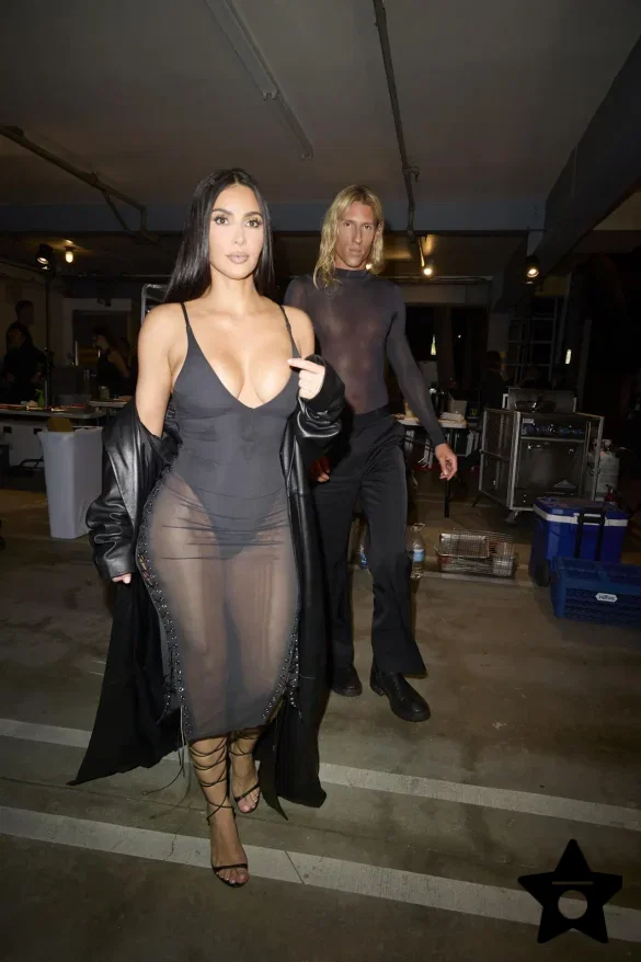 kim-kardashian-in-a-sheer-black-dress-and-leather-coat-leaves-the-update-pop-up-on-melrose-10 Kim Kardashian in a Sheer Black Dress and Leather Coat Leaves the UpDate Pop-Up on Melrose