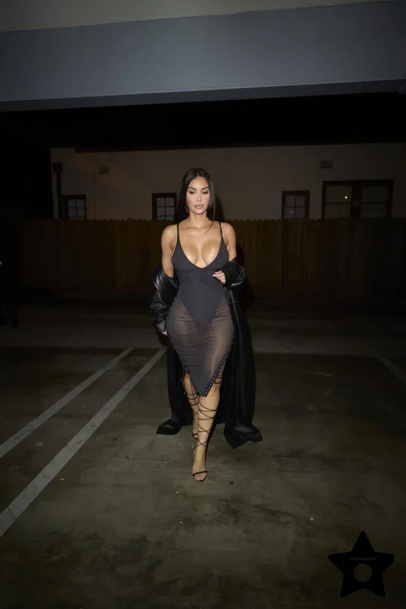 kim-kardashian-in-a-sheer-black-dress-and-leather-coat-leaves-the-update-pop-up-on-melrose-2 Kim Kardashian in a Sheer Black Dress and Leather Coat Leaves the UpDate Pop-Up on Melrose