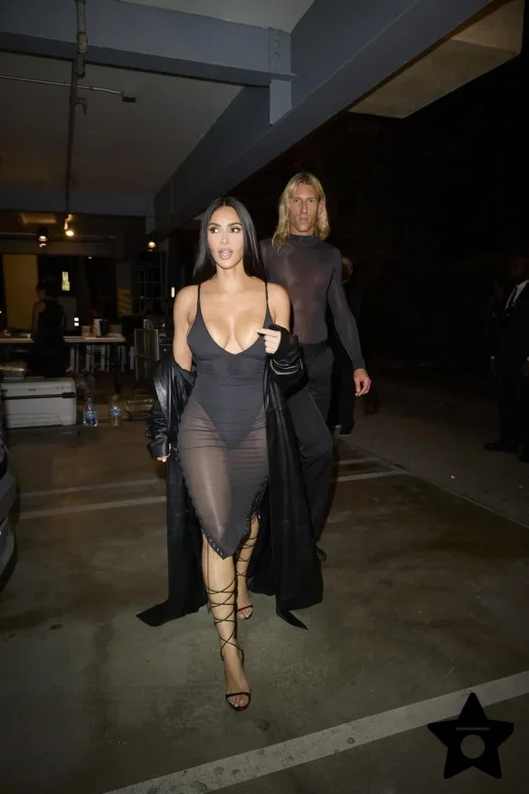kim-kardashian-in-a-sheer-black-dress-and-leather-coat-leaves-the-update-pop-up-on-melrose-5 Kim Kardashian in a Sheer Black Dress and Leather Coat Leaves the UpDate Pop-Up on Melrose