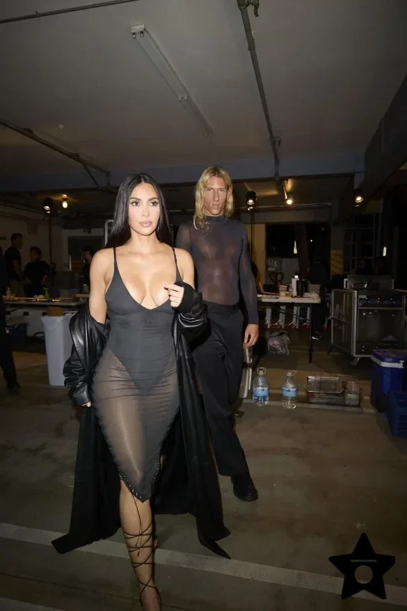 kim-kardashian-in-a-sheer-black-dress-and-leather-coat-leaves-the-update-pop-up-on-melrose-6 Kim Kardashian in a Sheer Black Dress and Leather Coat Leaves the UpDate Pop-Up on Melrose