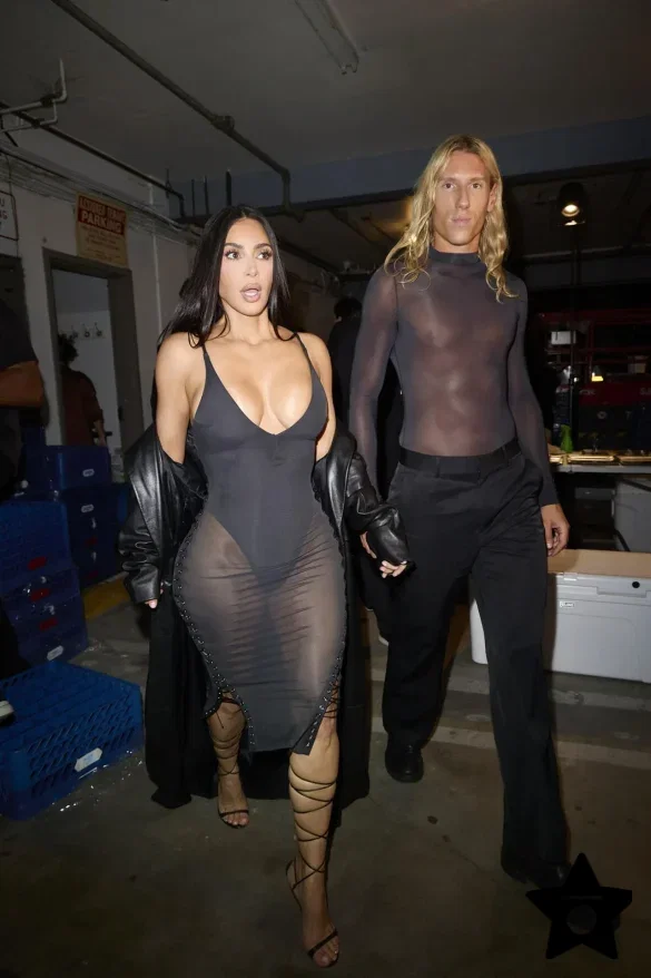 kim-kardashian-in-a-sheer-black-dress-and-leather-coat-leaves-the-update-pop-up-on-melrose-8 Kim Kardashian in a Sheer Black Dress and Leather Coat Leaves the UpDate Pop-Up on Melrose