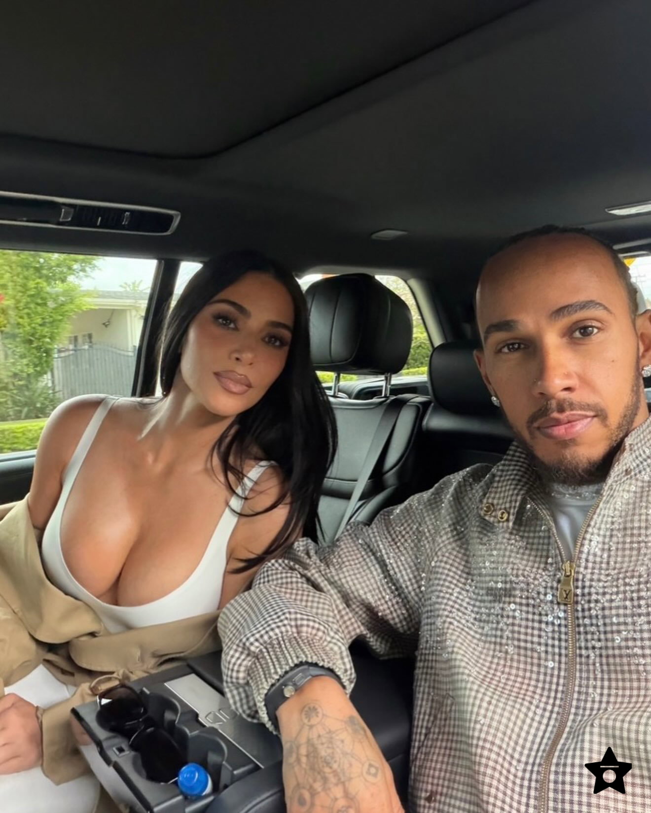 Kim Kardashian and Lewis Hamilton get cosy in loved-up photos from romantic getaway