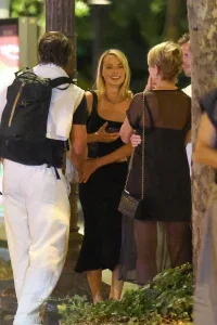 Margot Robbie Black Midi Skirt Look in Paris – August 15, 2026 29 Margot Robbie Black Midi Skirt Look in Paris – August 15, 2026