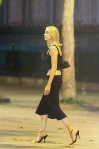 Margot Robbie Black Midi Skirt Look in Paris – August 15, 2026 28 Margot Robbie Black Midi Skirt Look in Paris – August 15, 2026