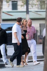 Margot Robbie Black Midi Skirt Look in Paris – August 15, 2026 35 Margot Robbie Black Midi Skirt Look in Paris – August 15, 2026