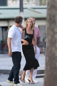 Margot Robbie Black Midi Skirt Look in Paris – August 15, 2026 27 Margot Robbie Black Midi Skirt Look in Paris – August 15, 2026