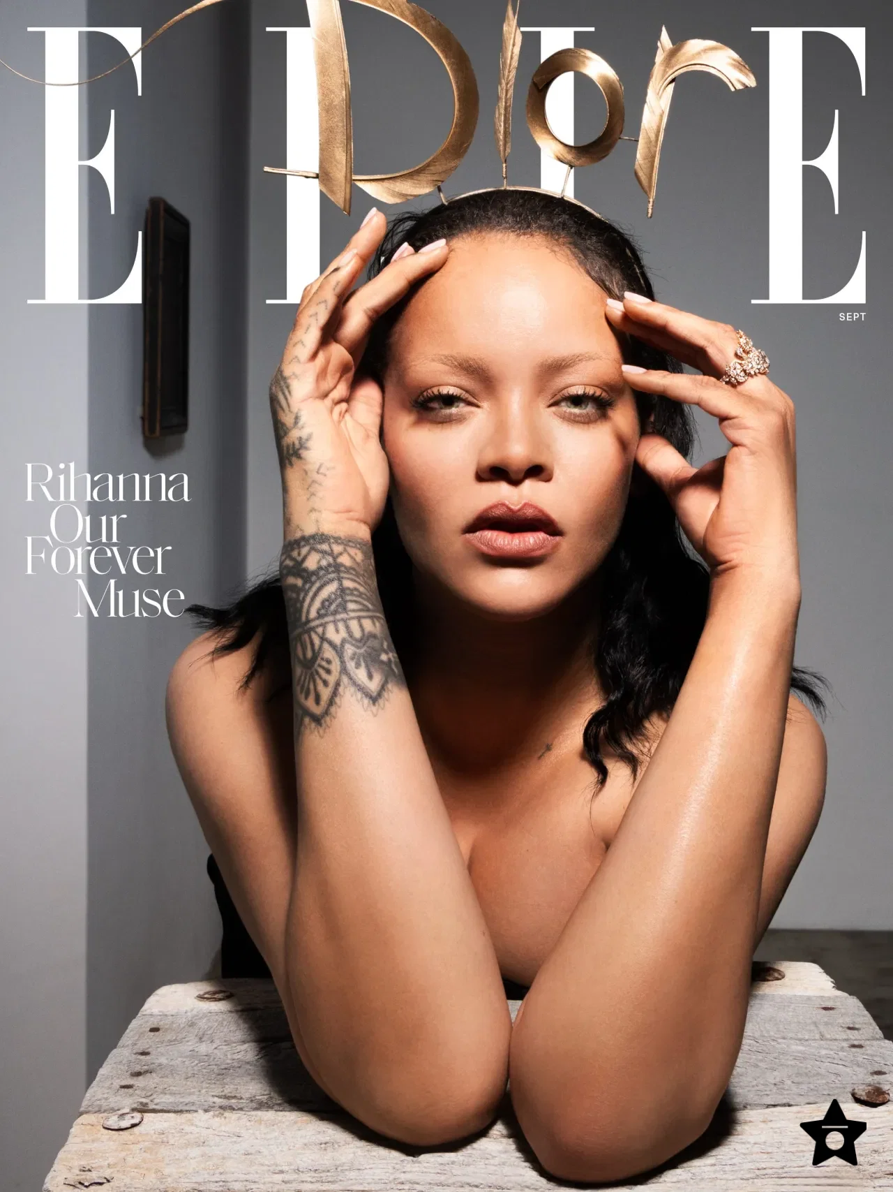 Rihanna US Elle Editorial Swings from Shaggy Orange Volume to Severe Black Draping