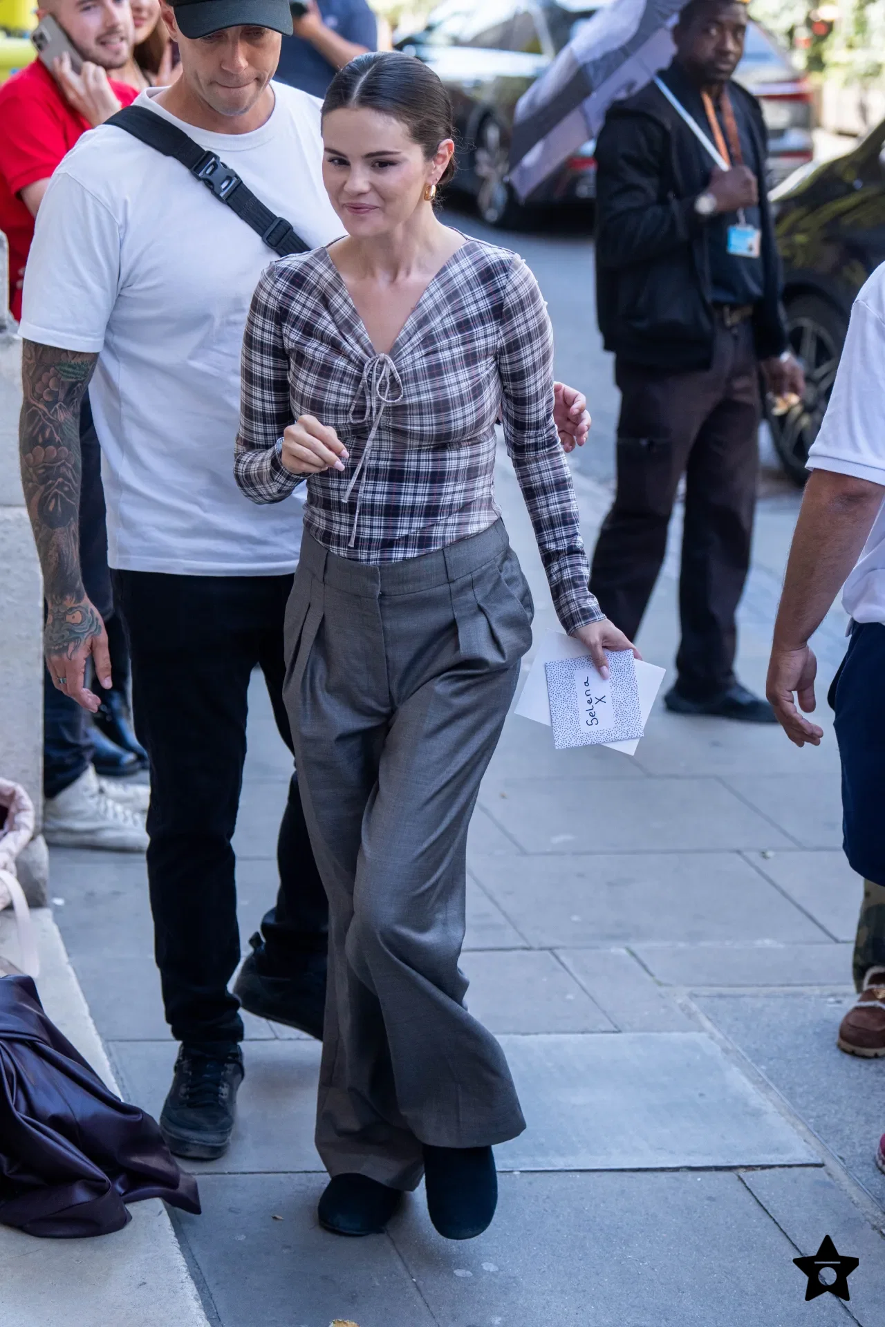 Selena Gomez Plaid Top Meets the Fuller Scale of Pleated Grey Trousers